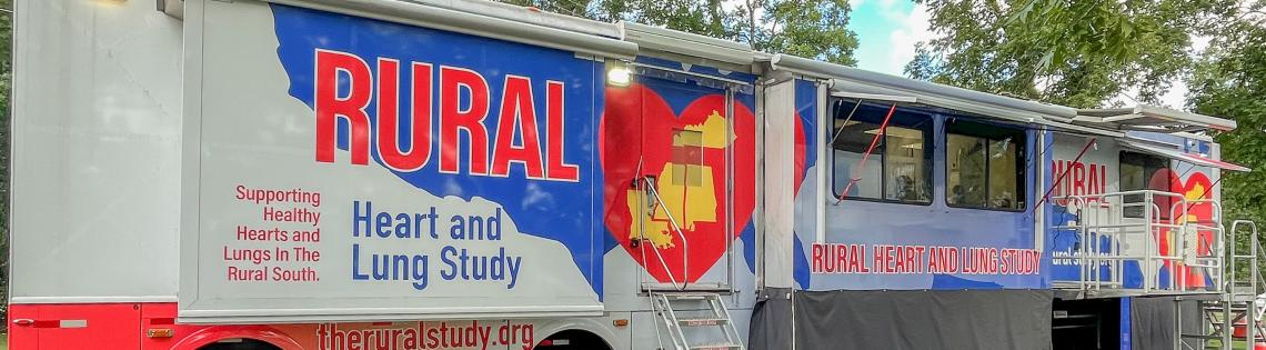 A long mobile van with a painted red heart and reads Rural Heart and Lung Study, Supporting Healthy Hearts and Lungs in the Rural South