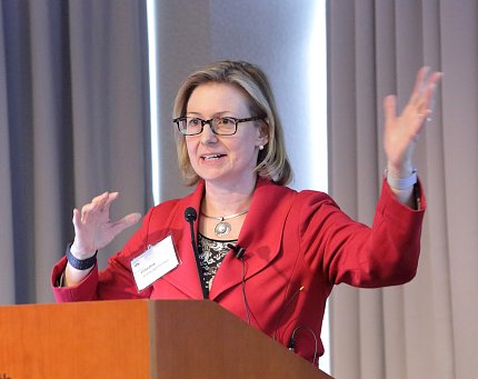 Dr. Picard speaks at podium.