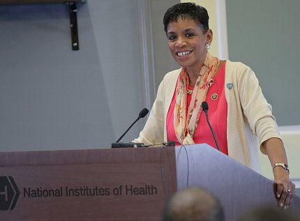 Rep. Donna Edwards stands at a podium