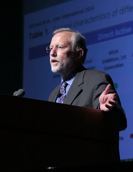 Dr. Rice speaks at podium.