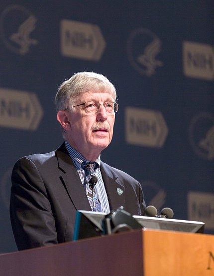 Collins speaks from the podium.