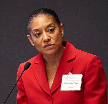 Le Fauve speaks at podium