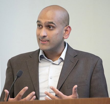 Sandeep Patel speaks at podium