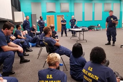 First responders meet at high school gym.