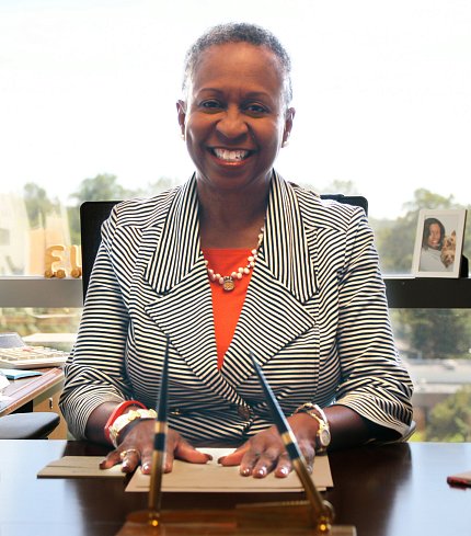 Donna Brooks sits in her office