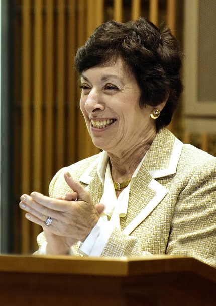 Birbaum smiles while she claps her hands