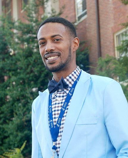 Flood stands with Bldg. 1 behind him.