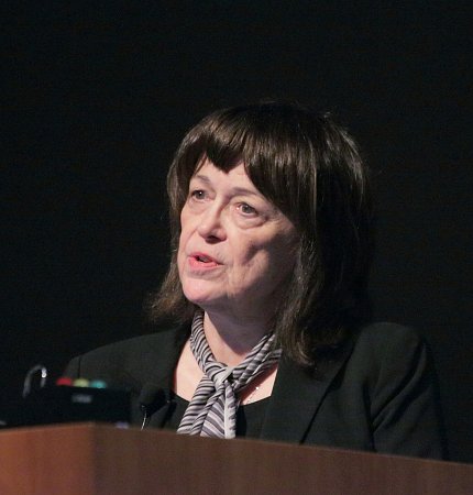 Buck speaks at a podium