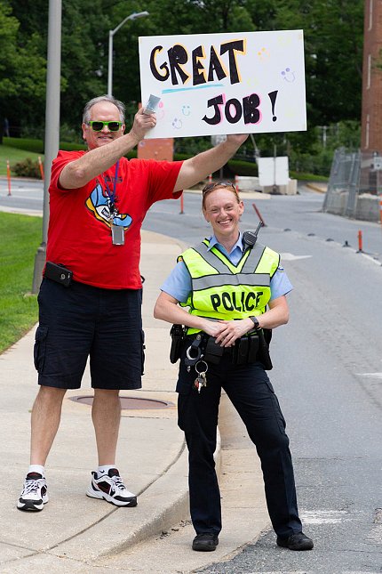 ORS’s Joe Cox and Cpl. Christine Fedorisko form cheering squad at hike.