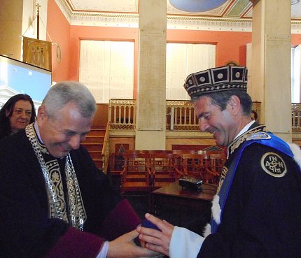 Dr. Constantine Stratakis receives an honorary doctorate, presented by Prof. George Zografos.