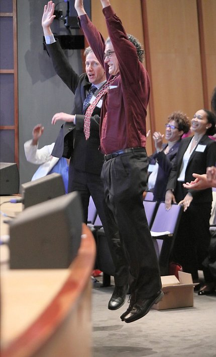 Dr. Eliseo Pérez-Stable and Jerry Sheehan jump.