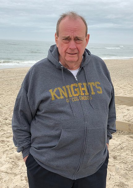 Dr. Fred Taylor standing on the beach.