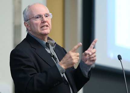 Mundie speaking at the microphone.