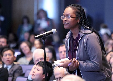 An attendee asks a question at the summit