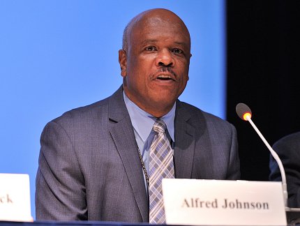 Johnson speaks on a panel
