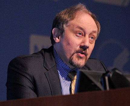 Keckler speaks at a podium