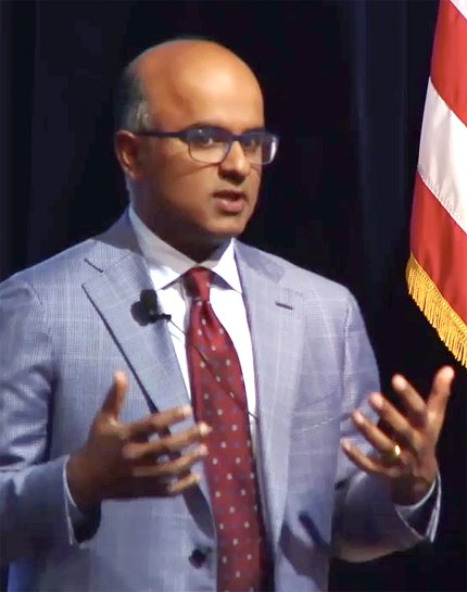 Dr. Sekar Kathiresan at podium
