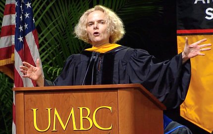 Volkow gestures at podium of UMBC graduation ceremony