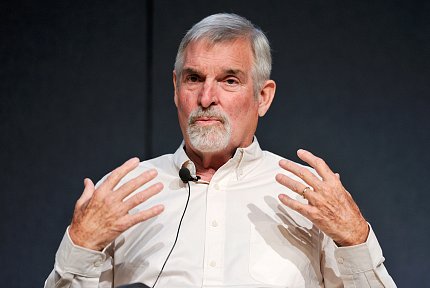 Patterson gestures with both hands