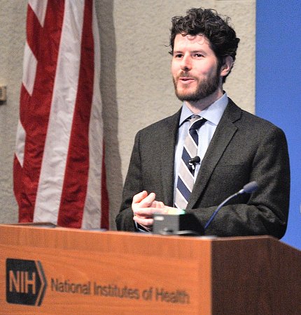 Dr. Bulea is speaking at the podium.