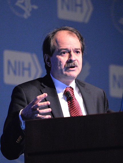 Ioannidis gestures from podium