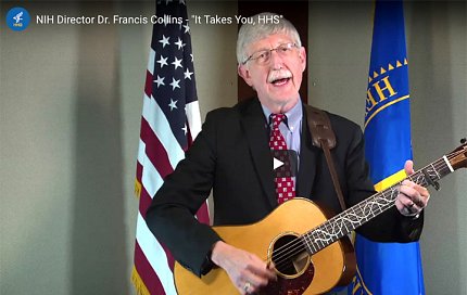 Collins plays the guitar