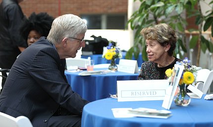 Dr. Collins comforts Steve Katz' widow Linda