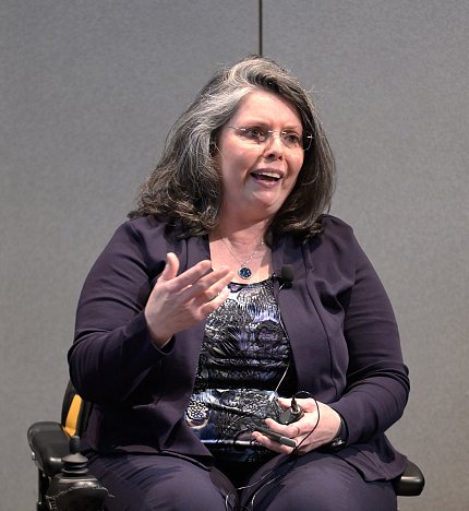 Mann Koepke gestures while she speaks