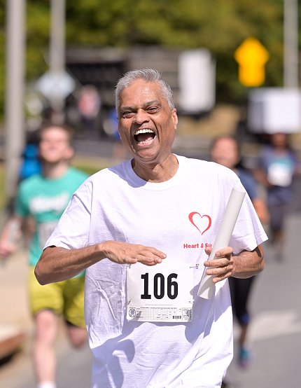 Dr. Danthi runs towards the finish line