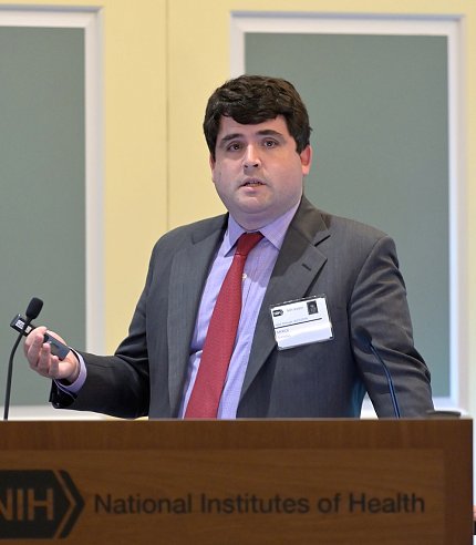 Dr. Shinall stands at podium in Wilson Hall.