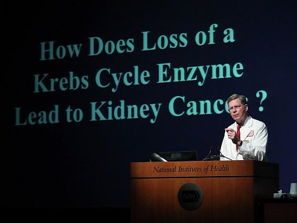 Dr. Linehan at podium.