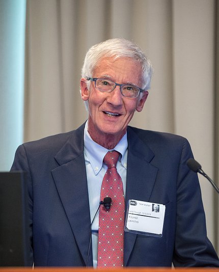 Griffiths speaks at podium