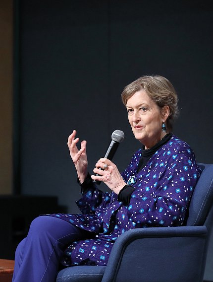 Dr. Olsen talks to audience.