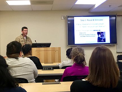 Dr. Goldstein talks to the class.