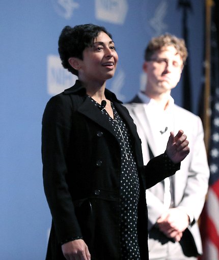 Drs. Vallabh and Minikel on stage together