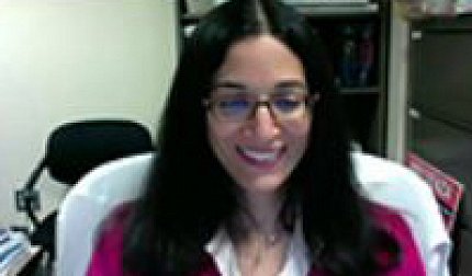 Palmore smiles on video screen