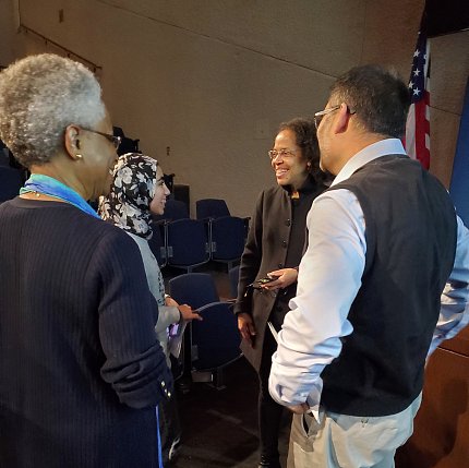 Dr. Barabino greets people after her talk.