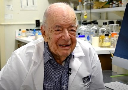 A smiling Dr. Tabor in his lab