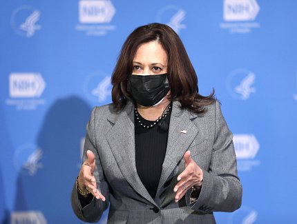 Harris speaks directly to audience.