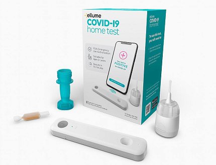 A box with the components of a new Covid-19 home test kit
