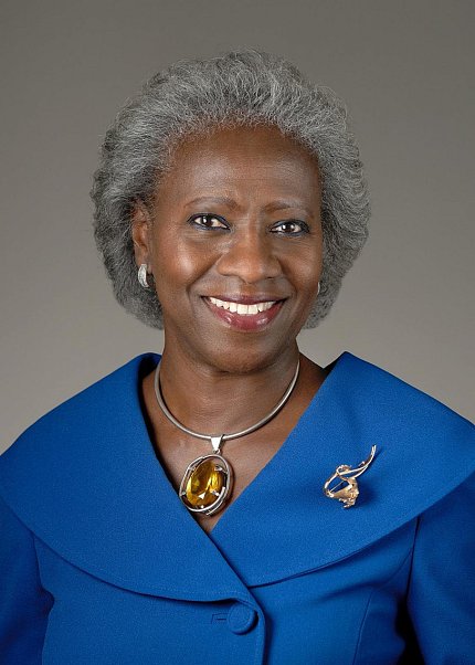 head &amp; shoulders shot of Valantine smiling