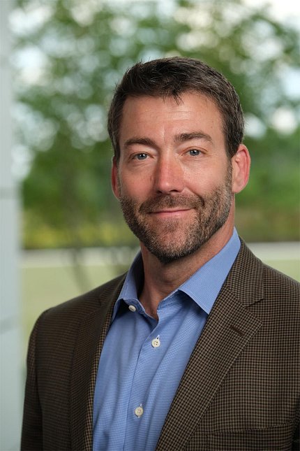 Head shot of Dr. Adam H. Russell