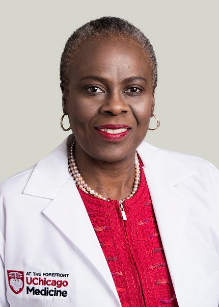 Olopade headshot, in labcoat