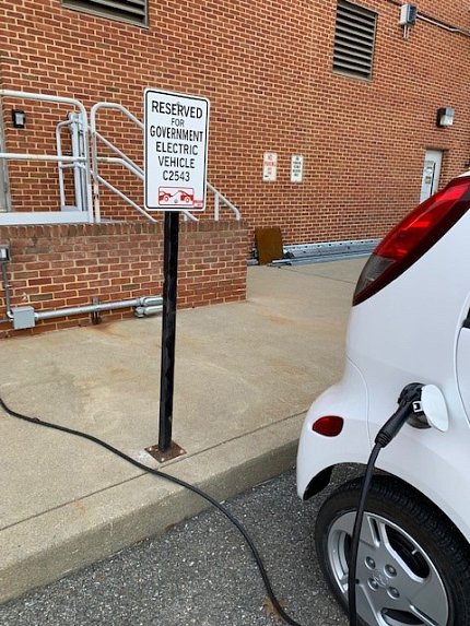 A car with the plug in is charging