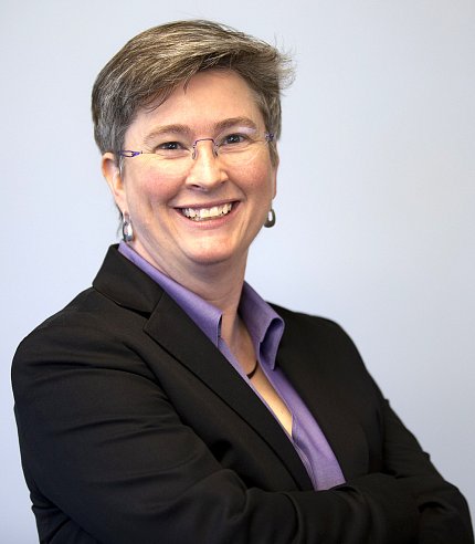 A smiling Dr. Rutter