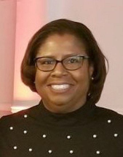 Headshot of Holliday