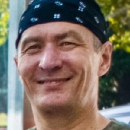 headshot of Iskhakov