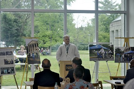 Cox speaks at a podium