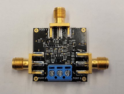 Back device with gold, silver, and blue components.