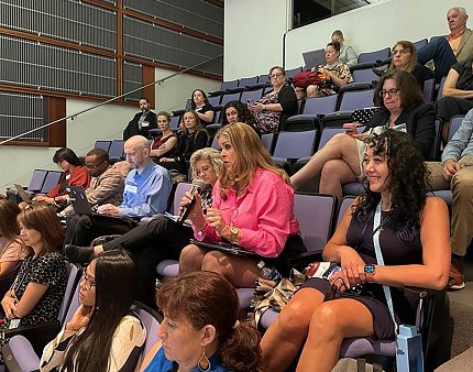 People in seats in an auditorium in Natcher Bldg.